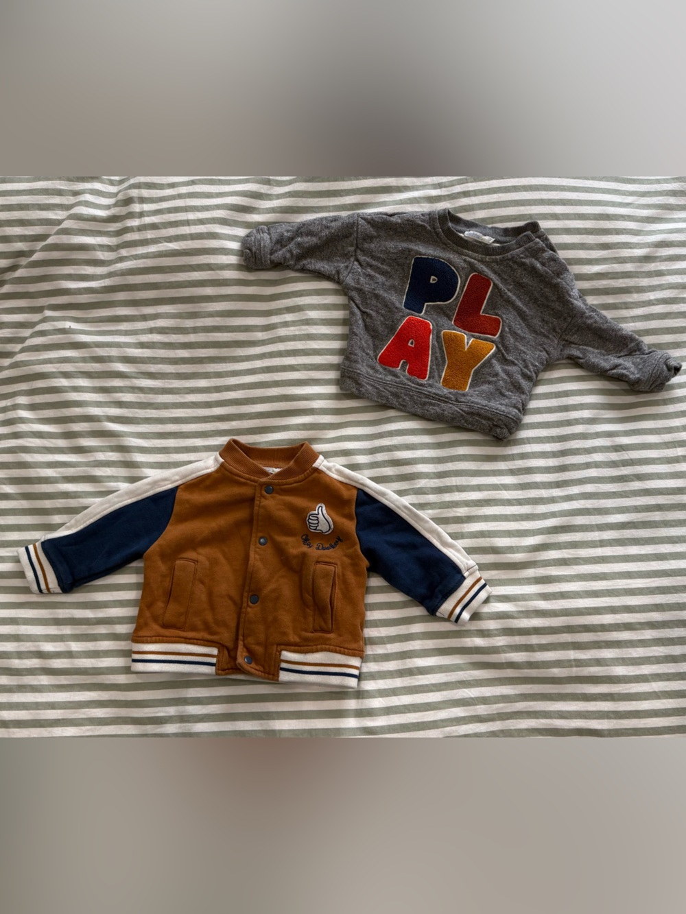 Grey sweatshirt and brown varsity jacket/cardigan